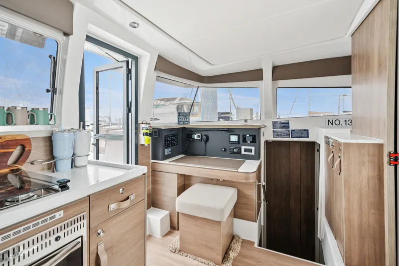 Slide: The Image of Modern interior of 2023 Bali 4.2 yacht with kitchen and navigation area. - 49