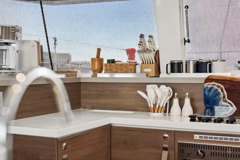 Slide: The Image of Modern kitchen interior on 2023 Bali 4.2 yacht with utensils and appliances. - 53