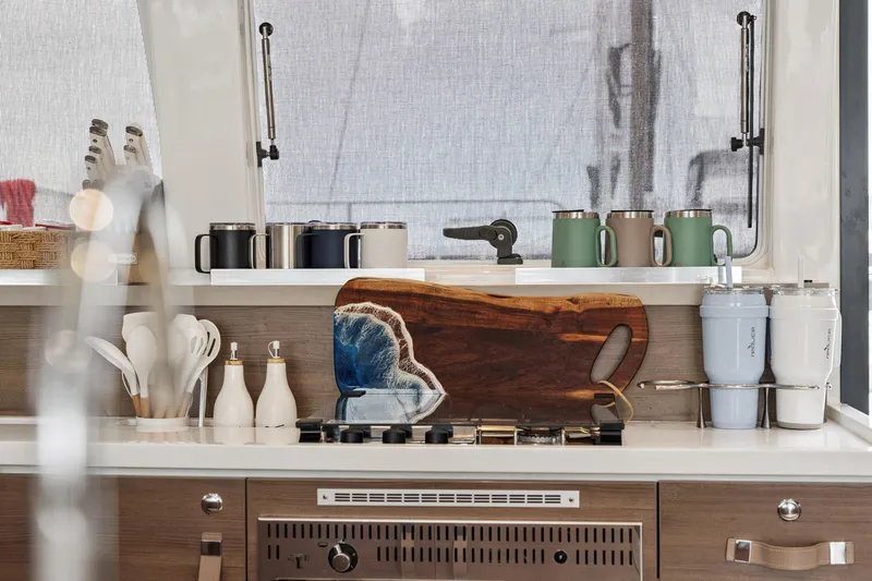 Slide: The Image of Modern kitchen interior on a 2023 Bali 4.2 yacht with stylish accessories. - 54