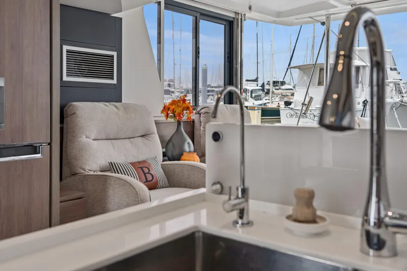 Slide: The Image of Luxurious interior of 2023 Bali 4.2 yacht with comfortable seating and marina view. - 55