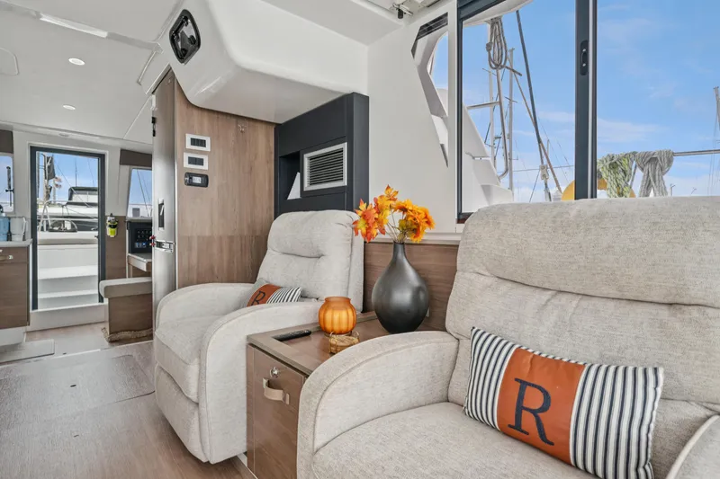 Slide: The Image of Luxurious interior of 2023 Bali 4.2 yacht with plush seating and elegant decor. - 63