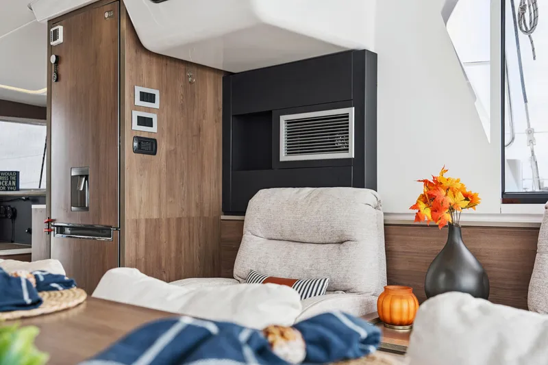 Slide: The Image of Luxurious interior of 2023 Bali 4.2 yacht with cozy seating and autumn decor. - 64