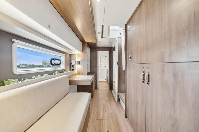 Slide: The Image of Modern interior of 2023 Bali 4.2 yacht with sleek wood finishes and ample natural light. - 71