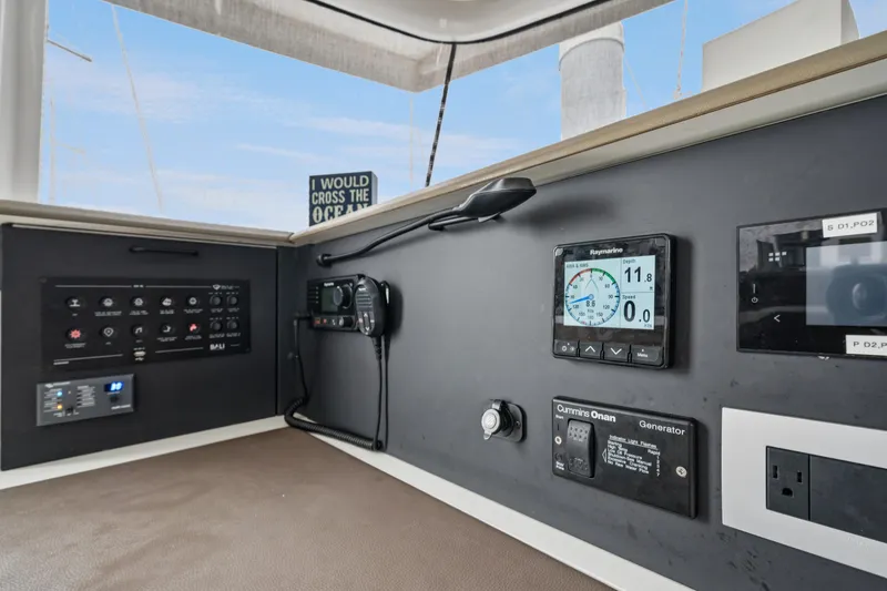 Slide: The Image of Control panel of 2023 Bali 4.2 yacht with navigation and communication equipment. - 80