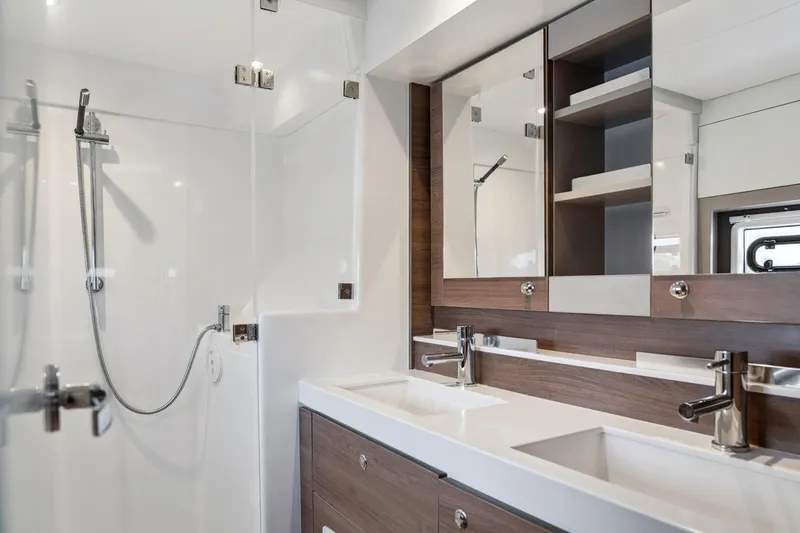 Slide: The Image of Modern bathroom interior on 2023 Bali 4.2 yacht, featuring dual sinks and sleek shower design. - 87