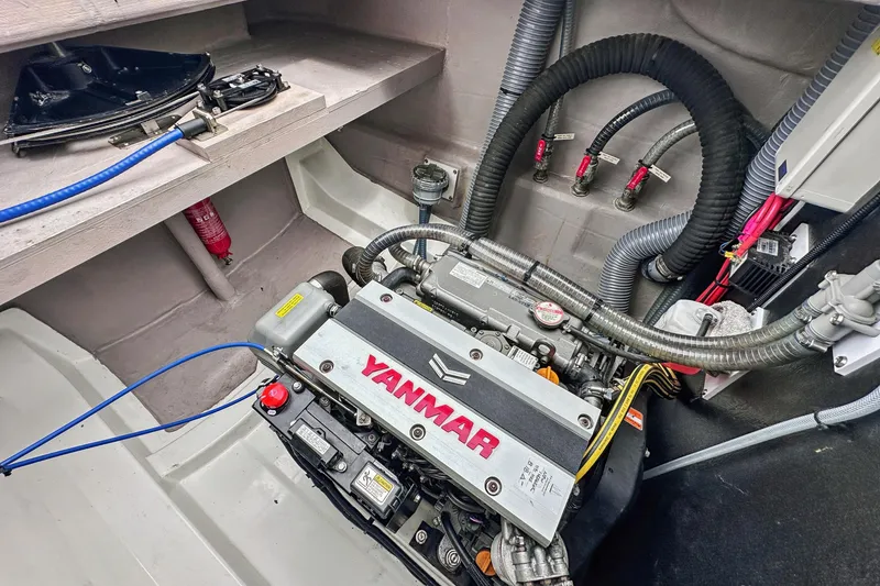 Slide: The Image of Engine room of 2023 Bali 4.2 yacht featuring a Yanmar engine and organized wiring. - 92