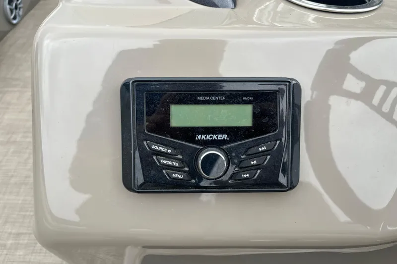 Slide: The Image of Kicker media center on 2022 Sun Tracker Party Barge 20 DLX boat dashboard. - 15