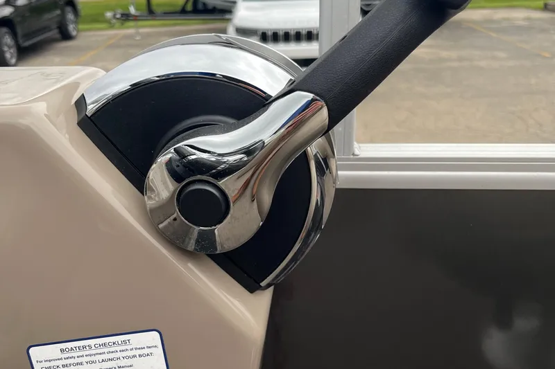 Slide: The Image of Close-up of 2022 Sun Tracker Party Barge 20 DLX throttle control. - 17