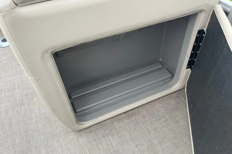 Slide: The Image of Open storage compartment on 2022 Sun Tracker Party Barge 20 DLX pontoon boat. - 3
