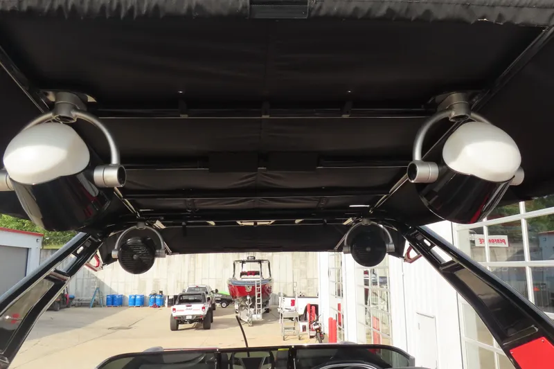 Slide: The Image of 2024 Trifecta 25Sport RF9 DC 3.0 Plus boat speakers and canopy detail. - 14