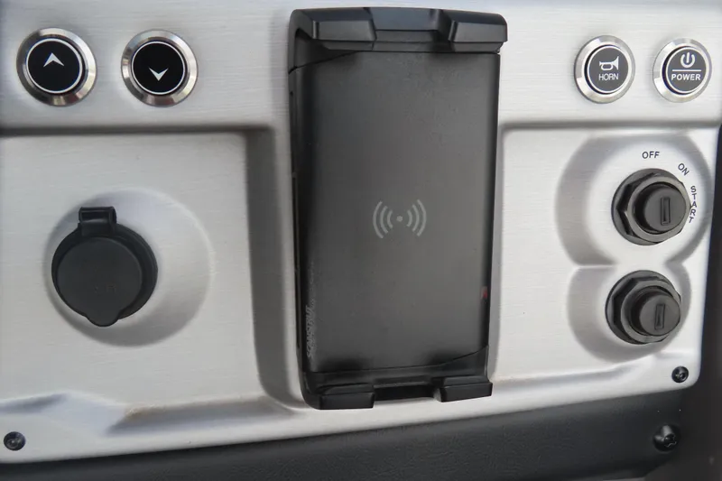 Slide: The Image of Control panel of 2024 Trifecta 25Sport RF9 DC 3.0 Plus with buttons and wireless charging dock. - 18