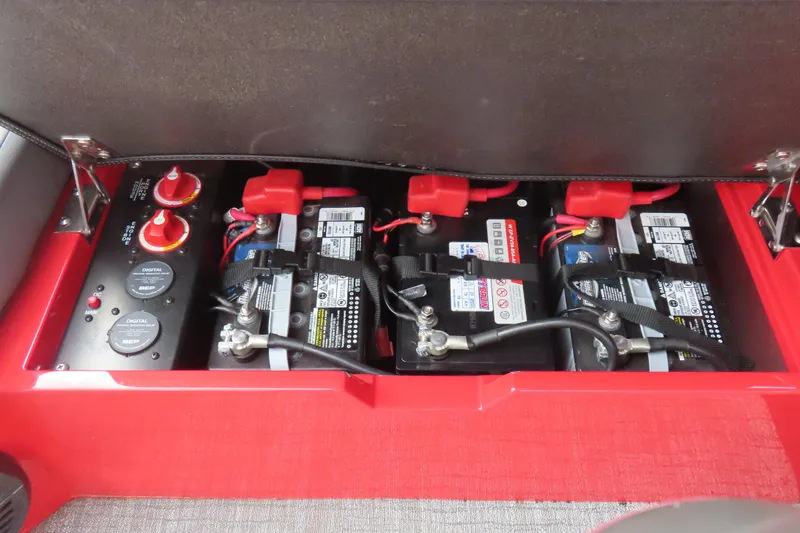 Slide: The Image of Battery compartment of 2024 Trifecta 25Sport RF9 DC 3.0 Plus with wiring and controls. - 27