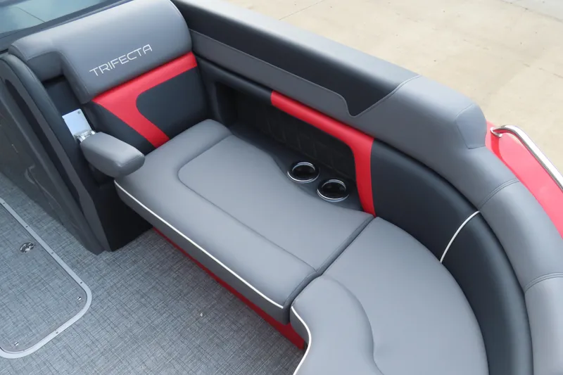 Slide: The Image of Luxurious seating on 2024 Trifecta 25Sport RF9 DC 3.0 Plus boat, featuring gray and red upholstery. - 9
