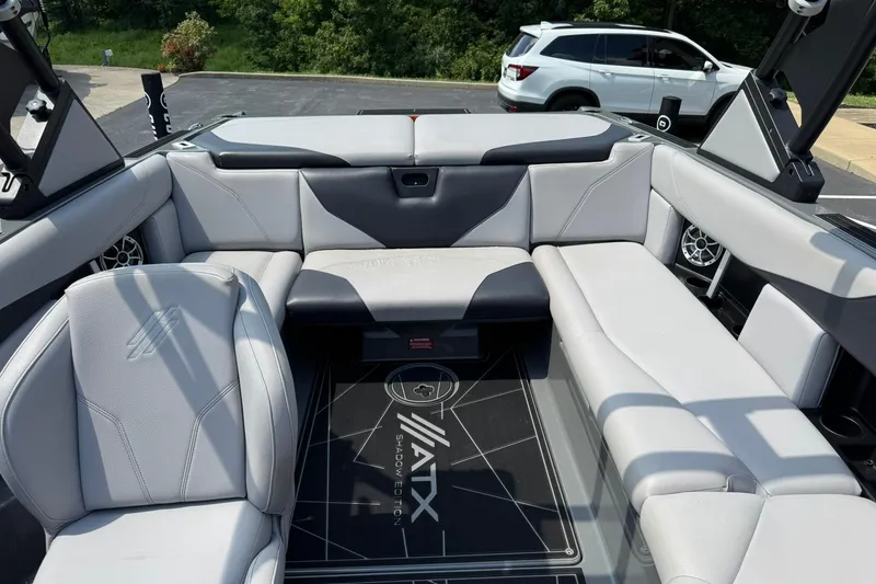 Slide: The Image of 2020 ATX Surf Boats 22 Type-S interior with gray seating and modern design. - 11