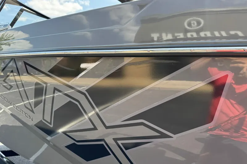 Slide: The Image of 2020 ATX Surf Boats 22 Type-S, sleek design with bold graphics and reflective finish. - 15