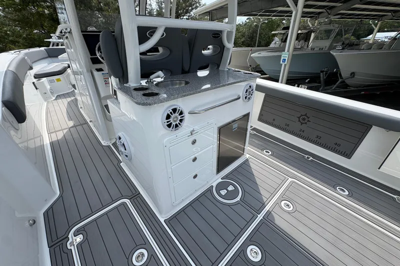 Slide: The Image of 2026 NauticStar 332 Offshore boat interior with sleek design and modern amenities. - 36