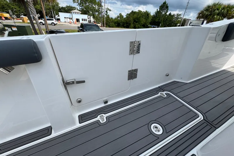Slide: The Image of 2026 NauticStar 332 Offshore boat deck with sleek design and modern fittings. - 40