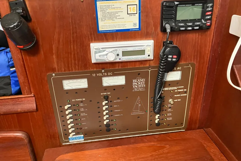 Slide: The Image of Electrical panel of a 1990 Island Packet 32 Cutter yacht with radio and controls. - 37