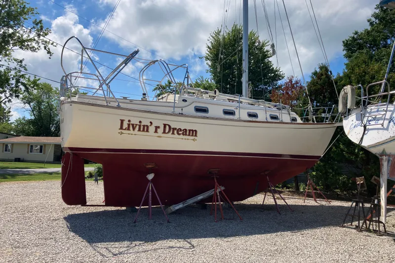 Slide: The Image of 1990 Island Packet 32 sailboat "Livin' r Dream" on stands, ready for maintenance. - 6