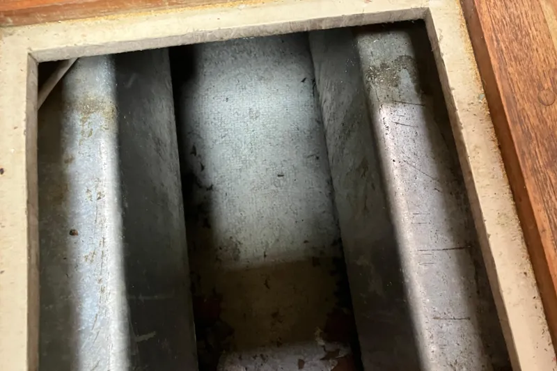 Slide: The Image of Interior view of 1990 Island Packet 32 Cutter sailboat compartment. - 28