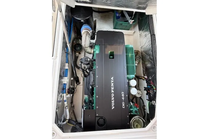Slide: The Image of 2024 Cutwater C-30 Sedan engine compartment featuring Volvo Penta D6-440 engine. - 19