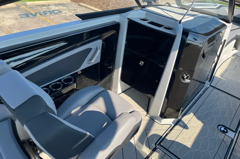 Slide: The Image of 2024 Yamaha Boats 255XD interior with sleek seating and modern design features. - 8