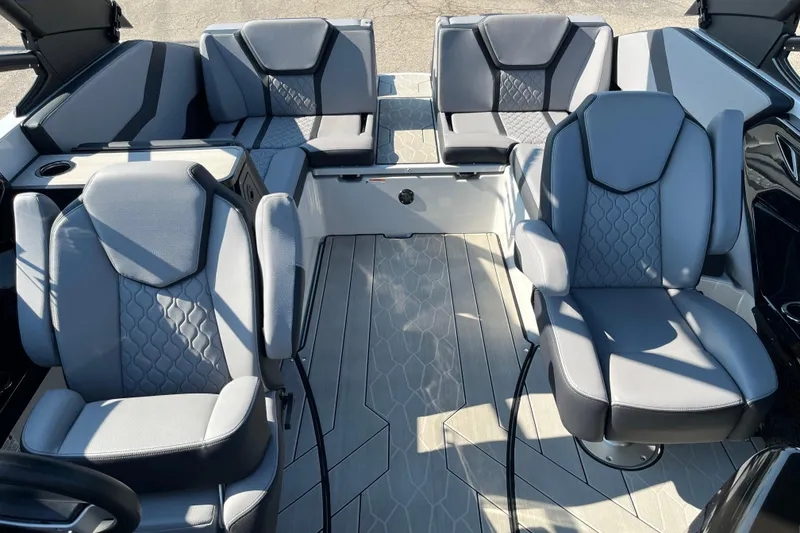 Slide: The Image of 2024 Yamaha Boats 255XD interior with stylish gray seating and modern design. - 9