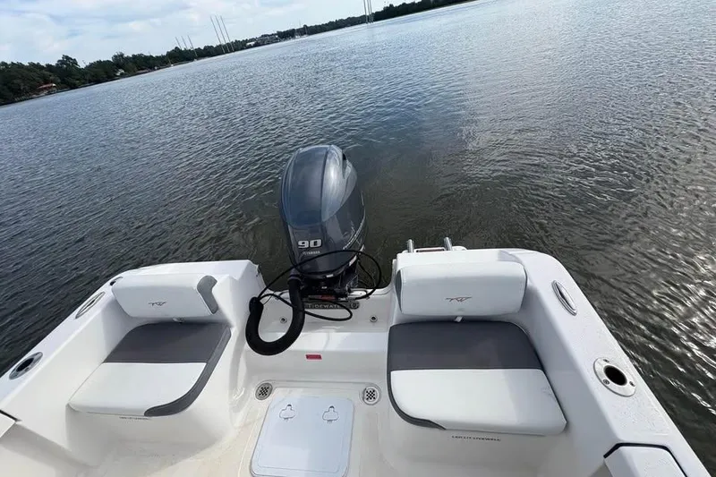 Slide: The Image of 2017 Tidewater 180 CC Adventure boat with Yamaha 90 engine on calm water. - 14