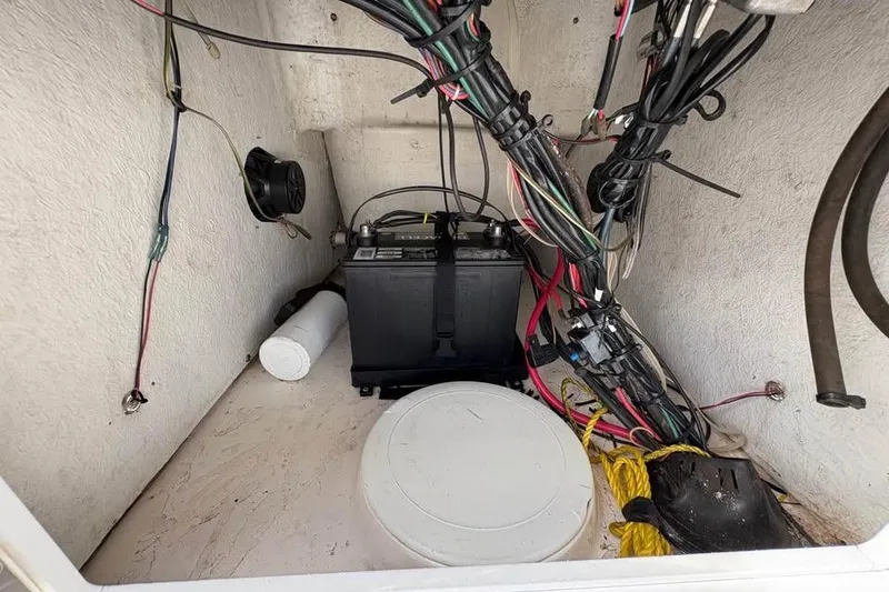 Slide: The Image of 2017 Tidewater 180 CC Adventure boat interior wiring and battery setup. - 15