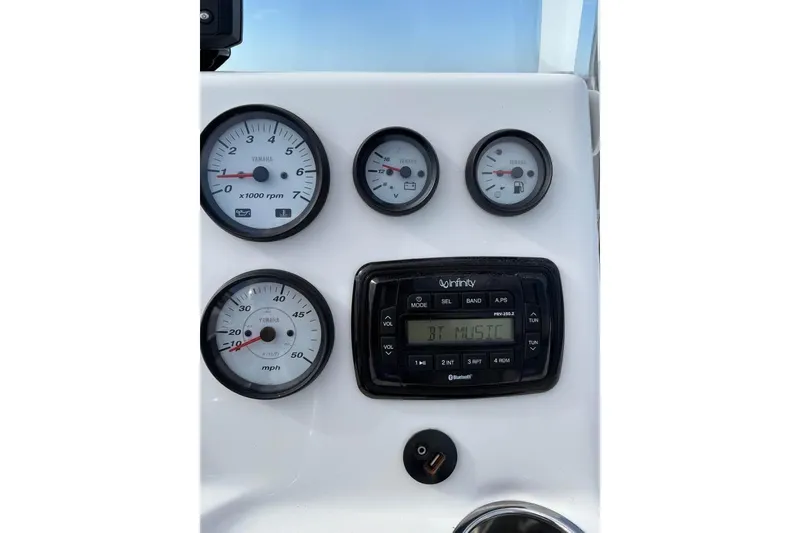 Slide: The Image of Dashboard of 2017 Tidewater 180 CC Adventure boat with gauges and Bluetooth stereo. - 20