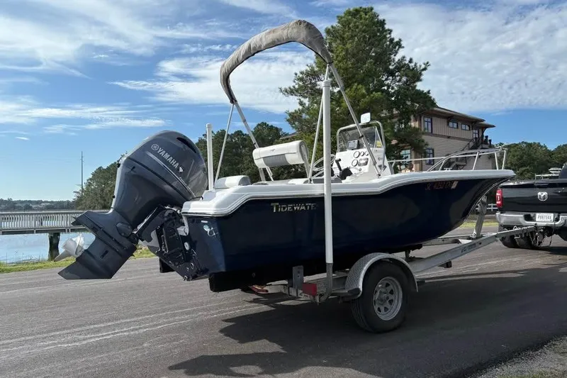 Slide: The Image of 2017 Tidewater 180 CC Adventure boat on trailer with Yamaha outboard motor. - 4