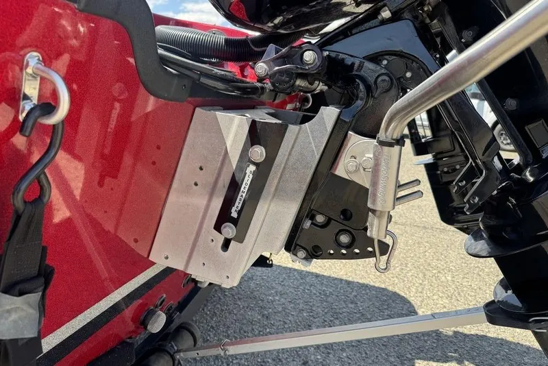 Slide: The Image of Close-up of a 2017 Nitro ZV18 boat motor mount with red hull detailing. - 23