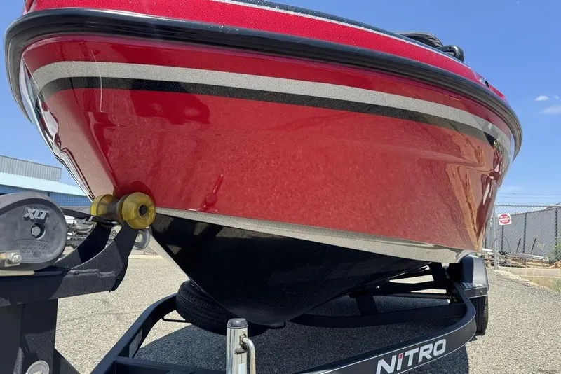 Slide: The Image of Red 2017 Nitro ZV18 boat on trailer, showcasing sleek design and vibrant color. - 26