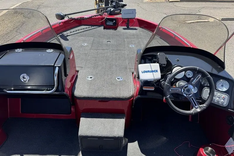 Slide: The Image of 2017 Nitro ZV18 boat interior with steering wheel, Lowrance and Garmin equipment. - 29