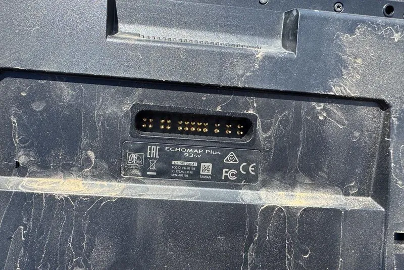 Slide: The Image of Close-up of Echomap Plus 93sv connector on a dusty Nitro ZV18, 2017 model. - 31