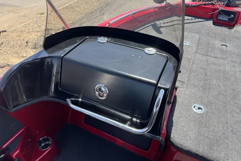 Slide: The Image of 2017 Nitro ZV18 boat dashboard with storage compartment and windshield. - 34