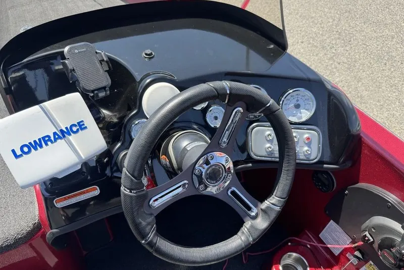 Slide: The Image of Steering console of a 2017 Nitro ZV18 boat with Lowrance navigation system. - 36