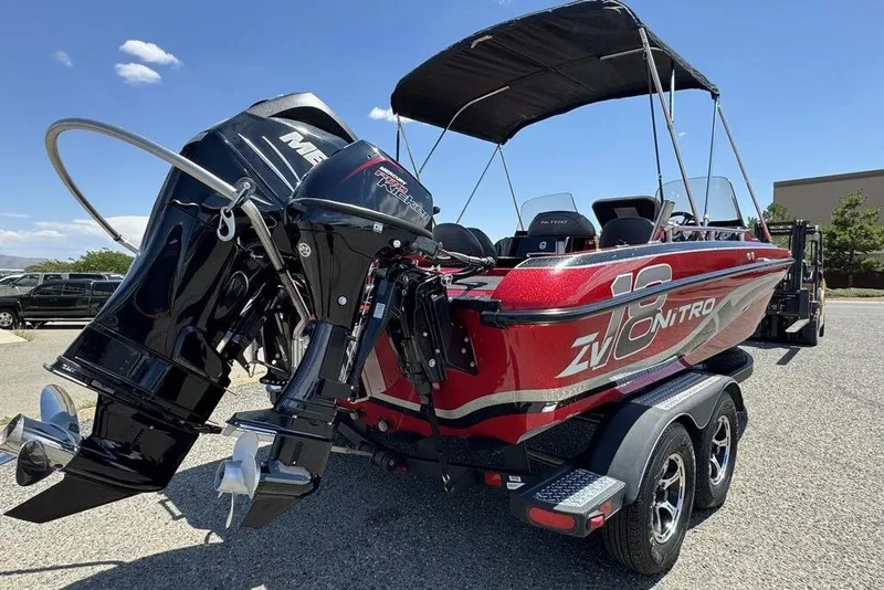 Slide: The Image of 2017 Nitro ZV18 boat with powerful Mercury outboard engine, parked on a trailer. - 45