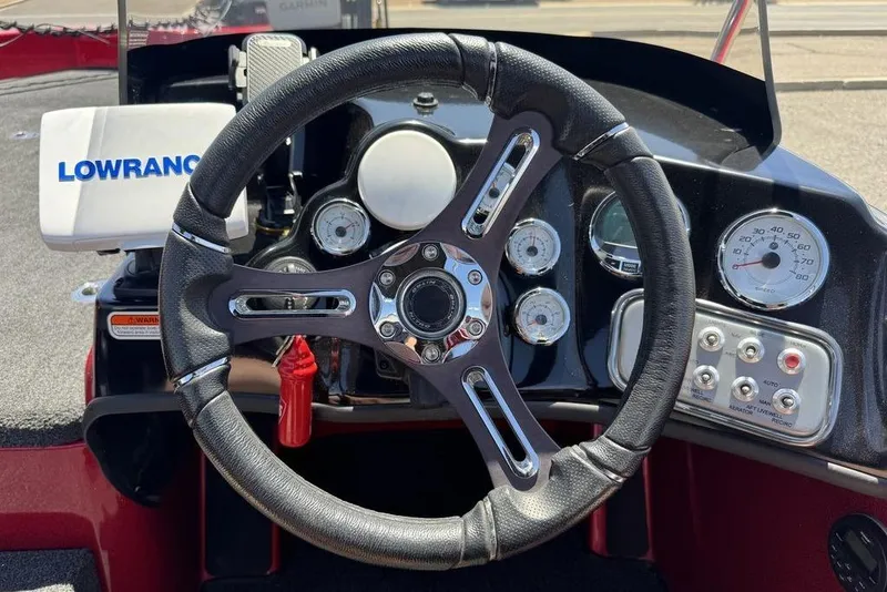 Slide: The Image of Steering wheel and dashboard of 2017 Nitro ZV18 boat with Lowrance device. - 53