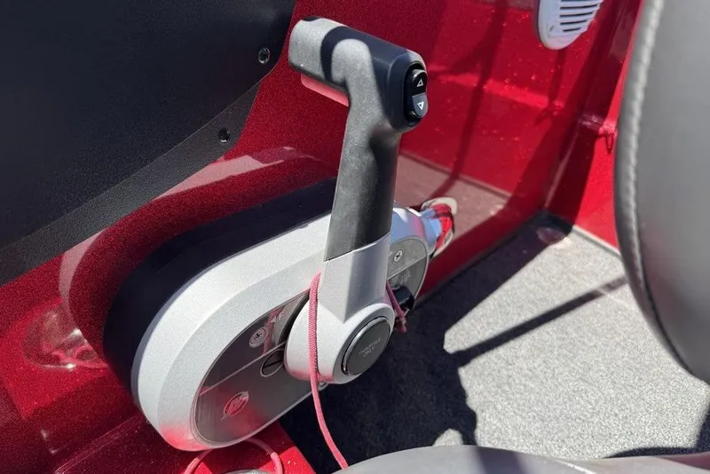 Slide: The Image of Throttle control lever on a 2017 Nitro ZV18 boat, red interior detail. - 58