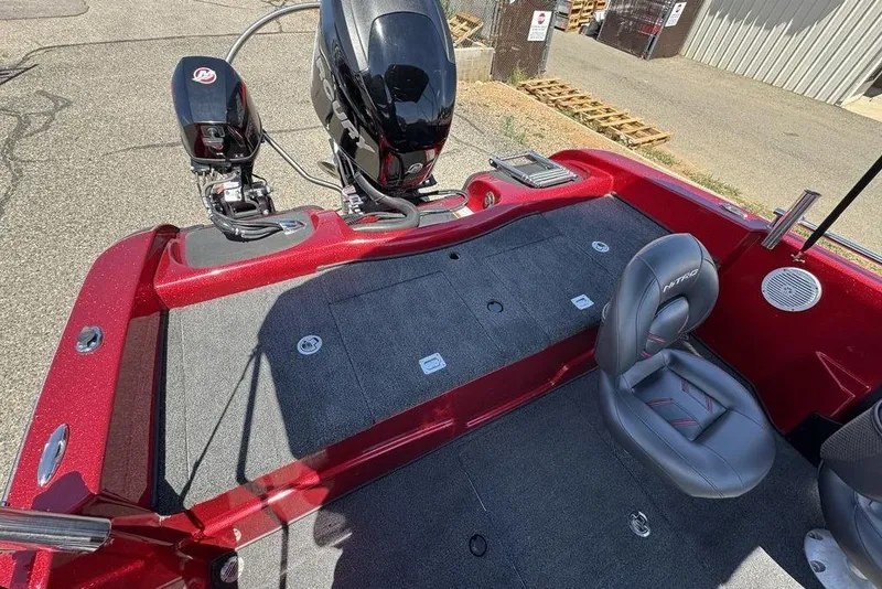 Slide: The Image of 2017 Nitro ZV18 boat interior with motor, red finish, and seating. - 61