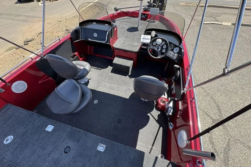 Slide: The Image of Interior of a 2017 Nitro ZV18 boat with seating and control panel. - 63