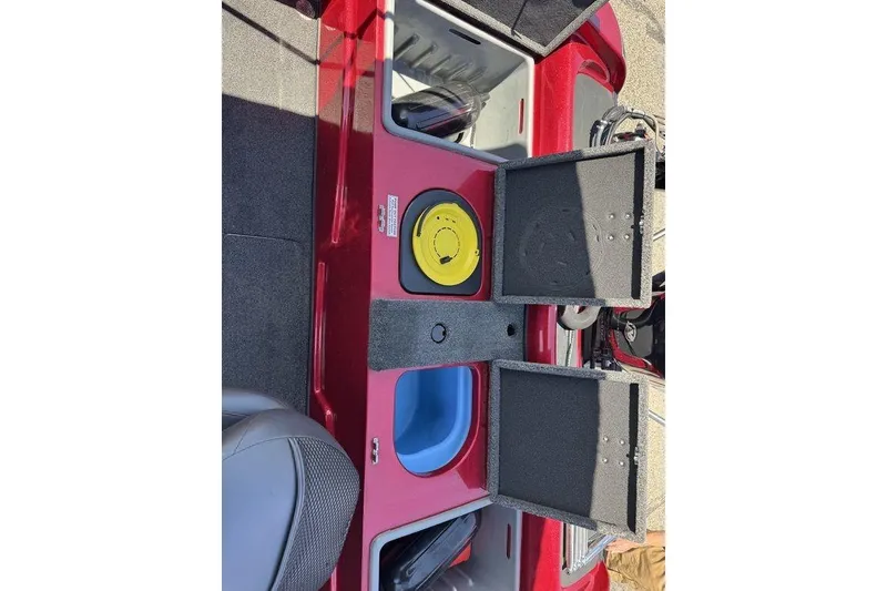 Slide: The Image of 2017 Nitro ZV18 boat interior with open storage compartments and seating. - 66