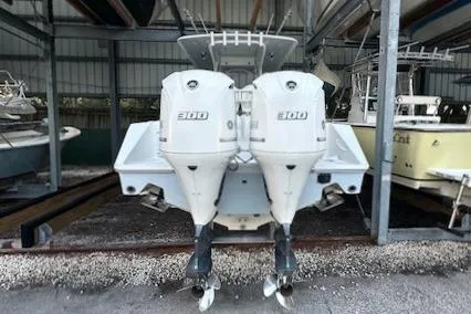 Slide: The Image of 2015 Jupiter 30 CC boat with dual outboard engines in storage facility. - 1