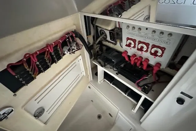 Slide: The Image of Electrical system of 2015 Jupiter 30 CC boat with battery switches and wiring. - 13