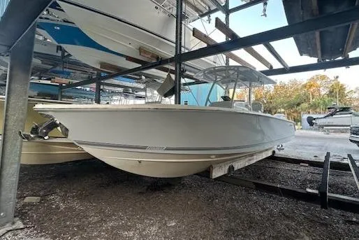 Slide: The Image of 2015 Jupiter 30 CC boat in storage, side view, on a trailer. - 3