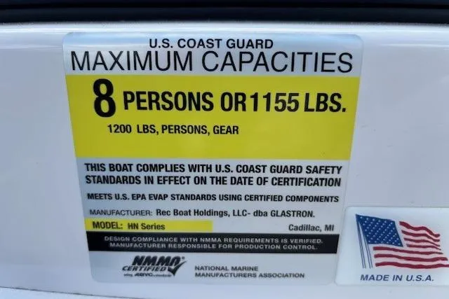 Slide: The Image of 2018 Glastron GT 187 capacity label: 8 persons or 1155 lbs, U.S. Coast Guard compliant. - 24