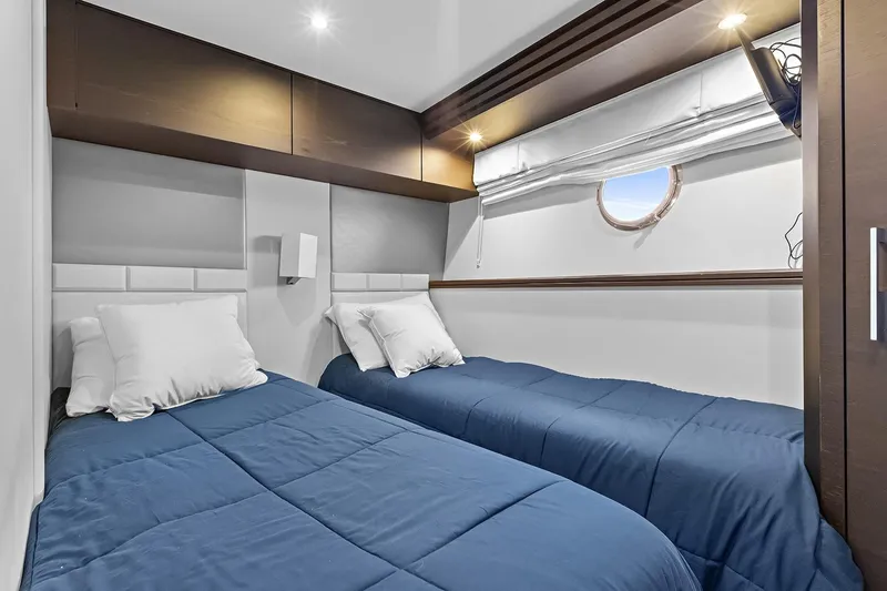 Slide: The Image of Luxurious twin cabin interior of 2016 Marquis 720 Fly Bridge yacht. - 37