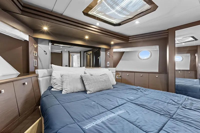 Slide: The Image of Luxurious bedroom interior of 2016 Marquis 720 Fly Bridge yacht with modern design. - 40