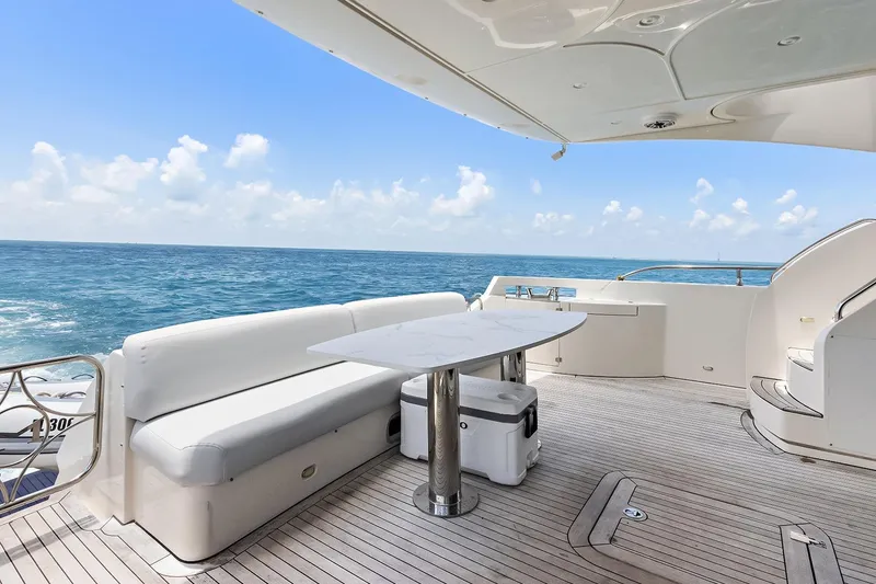 Slide: The Image of Luxury Marquis 720 Fly Bridge yacht deck with ocean view, 2016 model. - 54